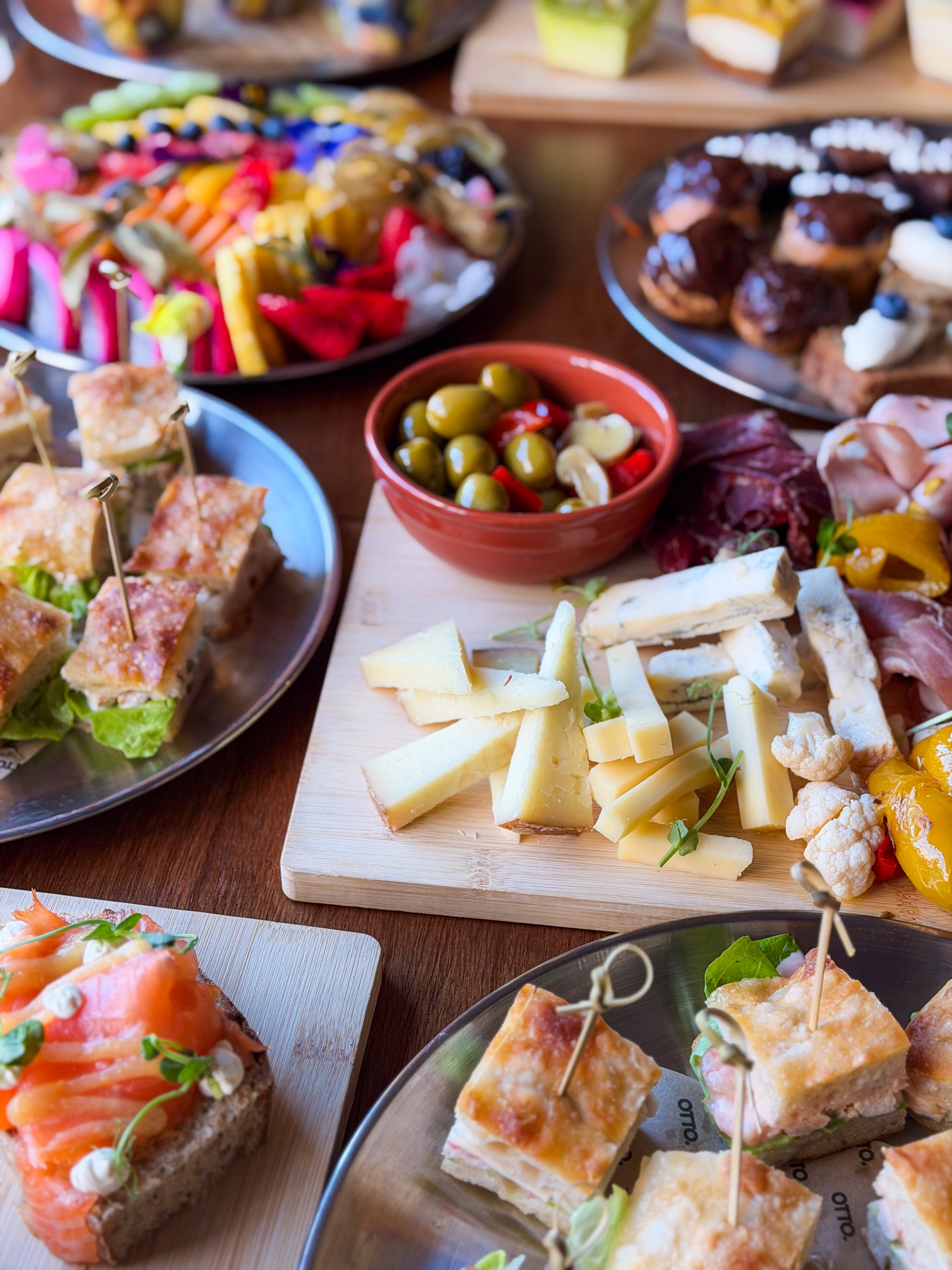 Cheese, olives and focaccia on the Otto catering table
